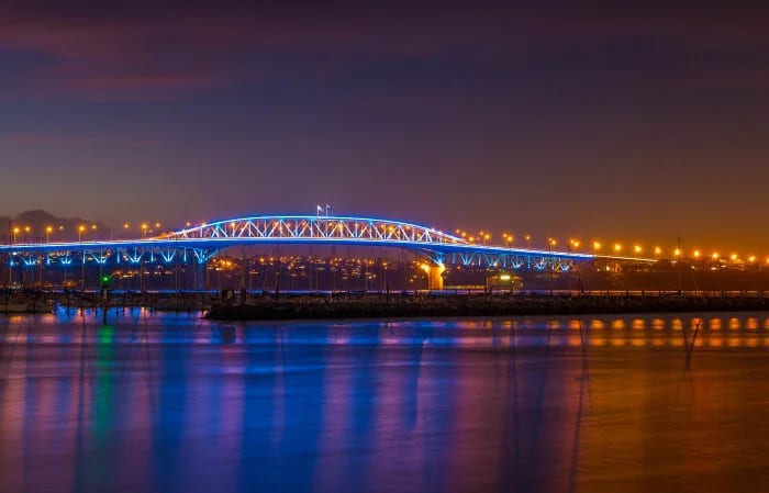 Auckland Harbour Bridge at night from the water