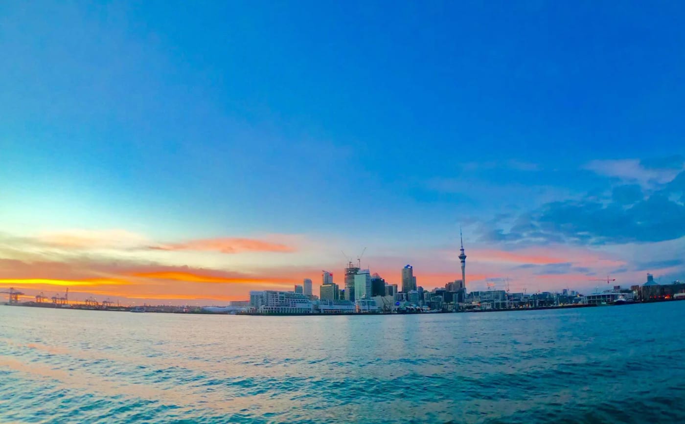 Auckland city skyline at sunrise from the harbour