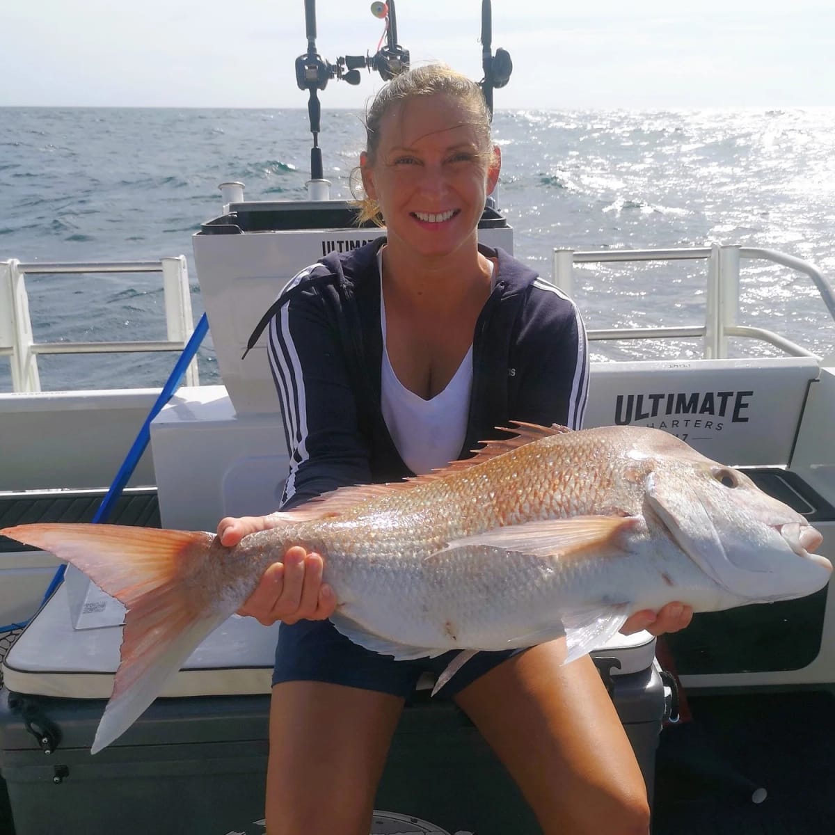 Fishing charter team and catch